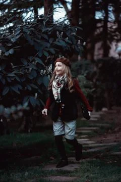 Young girl walking in the Park. Stock Photos