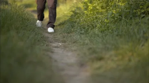 Young Girl is Walking on a Path Forward Stock Footage 51465929