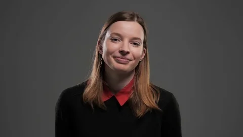 Young girl winks at the camera Video stock 105391999
