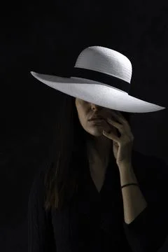 Young girl with withe hat 2 Stock Photos