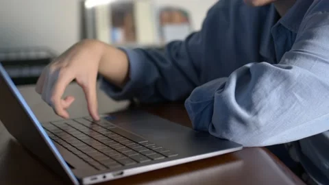 Young Girl is Working on Computer 2  Stock Footage 168302376