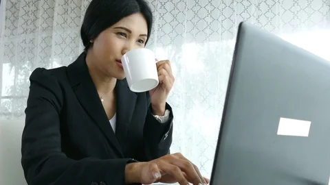 Young girl working by using computer Stock Footage 76997964