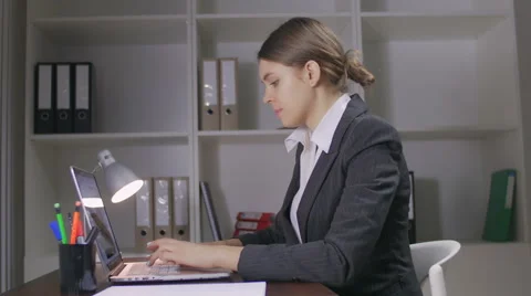 The young girl works at the computer Video stock 58590931
