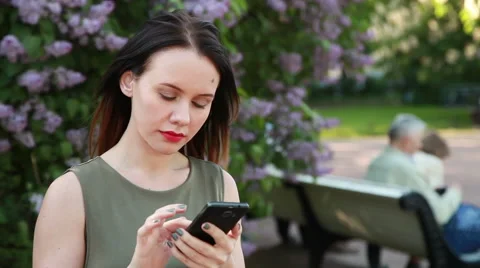 A young girl writes a message Stock Footage 50981455