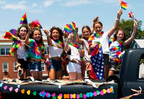 Young girls in back of truck celebrating at Car Pride parade in Babylon Vilag Stock Photos