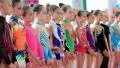 Young girls gymnasts in gym after final examination in Deriugina school HD Footage