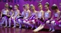 Young girls gymnasts at the New Year's performance in school of gymnastics HD Footage