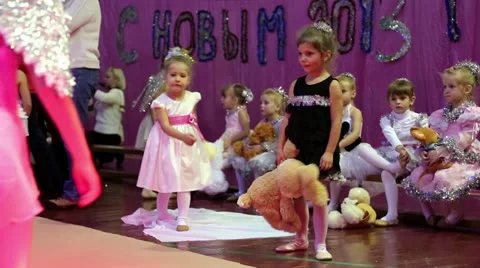 Young girls gymnasts at the New Year's performance in school of gymnastics Stock Footage