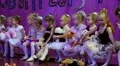 Young girls gymnasts at the New Year's performance in school of gymnastics HD Footage