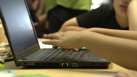 A young girl's hands practice using the computer Stock Footage 277615104