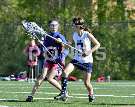 Young girls lacrosse Stock Photos