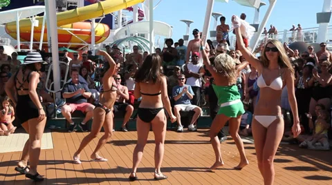 Young girls participate in dance competition on the deck of the cruise ship Stock Footage