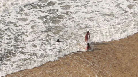 Young girls while bathing in the sea Stock Footage 32595831