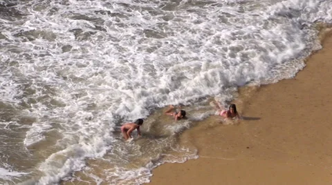 Young girls while bathing in the sea Stock Footage 32595847