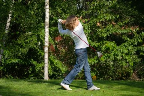 Young golf player with driver Stock Photos