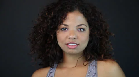 Young Gorgeous Hispanic Damsel combs her hair with a sexy smile Stock Footage 22760720