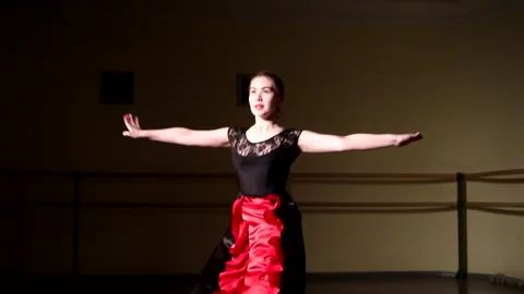 Young graceful ballerina dancing elements of classical ballet Stock Footage 148233085