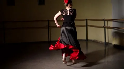 Young graceful ballerina dancing elements of classical ballet Stock Footage 148233258