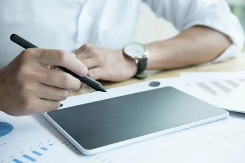 Young graphic designer working with computer. creative man using digital tabl Foto stock