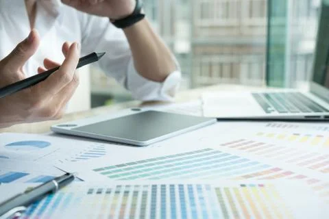 Young graphic designer working with computer and color swatch. creative man u Stock Photos