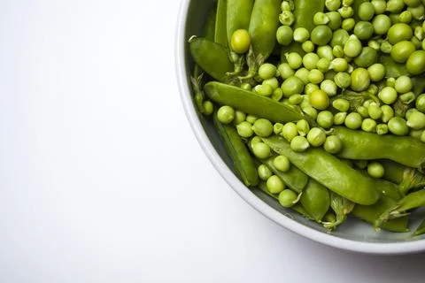 Young green peas close green vegetables food and drink objects Stock Photos