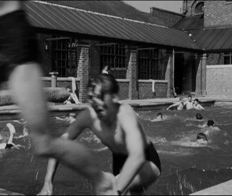 Young group of boys spending time outside, United Kingdom, UK, 1946 Stock Footage 133379277