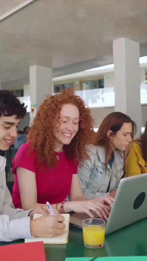 Young group of high school students studying together with laptop computer. Stock Footage 243730369