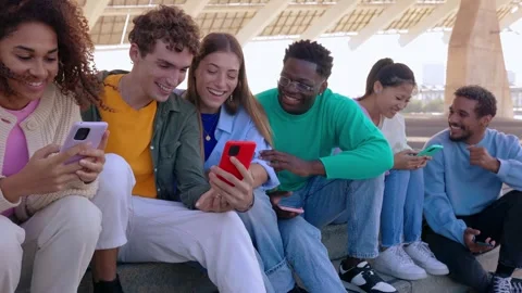 Young group of multiracial friends having fun using mobile phones Stock Footage 269563576