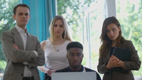 Young group staring at camera distrusting fraud diverse Stock Footage 89870673