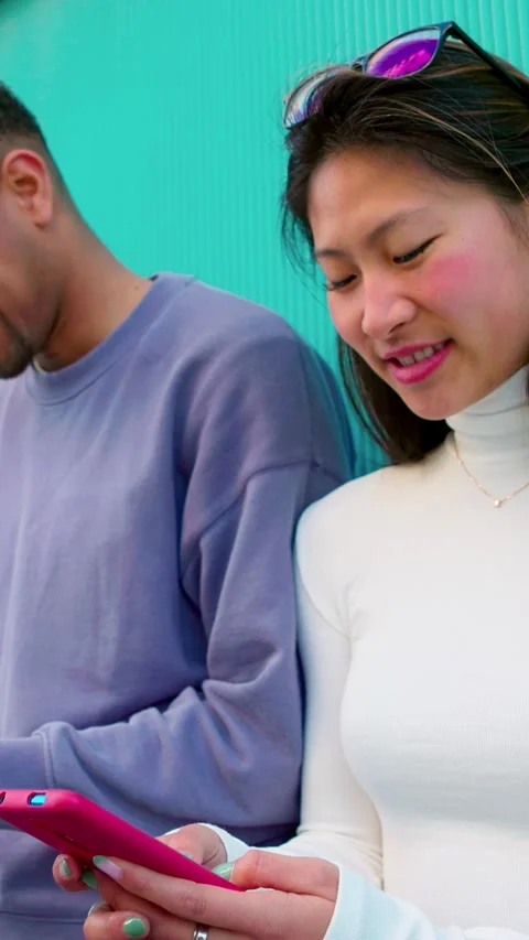 Young group of student people using mobile phones over wall building. Stock Footage 251028706