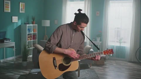 Young Guitar Player Has Fun at Home Stock-Footage 156747434