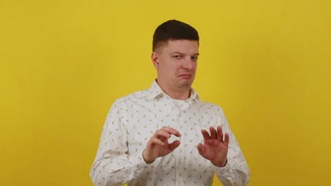 Young guy 20 years old with a grimace of disgust on his face. feeling of disgust Stock Footage 172044712