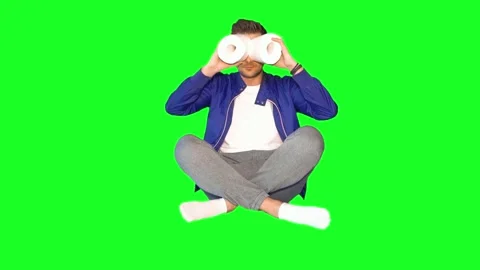 A young guy against the background of a chroma key Stock Footage 132166783