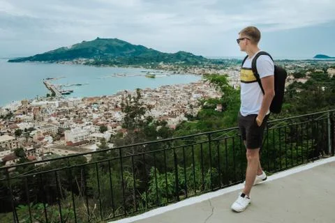 Young guy on the background of the city. Stock Photos