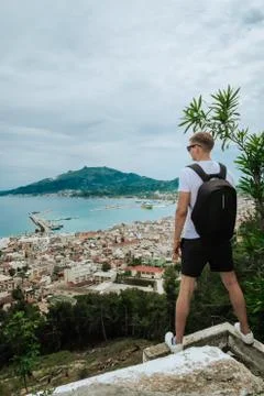 Young guy on the background of the city. Stock Photos
