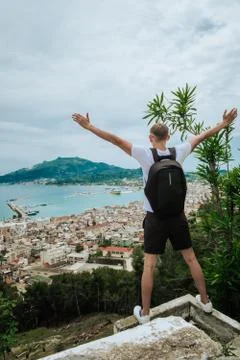 Young guy on the background of the city. Stock Photos