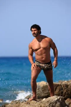 Young guy at the beach Stock Photos