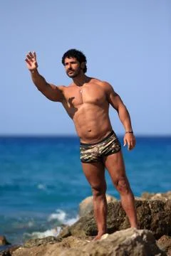 Young guy at the beach Stock Photos