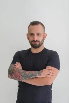 Young guy with beard and black hair outlined on a white background Foto stock