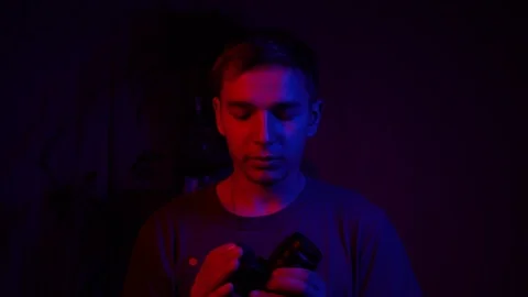 Young guy blogger talking about his new camera. Communicating with subscribers Stock Footage 122237339