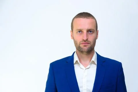 A young guy in a blue jacket is a duplicate of Hollywood actor Woody Harrelso Stock Photos