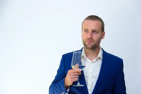 A young guy in a blue jacket is a duplicate of Hollywood actor Woody Harrelso Stock Photos