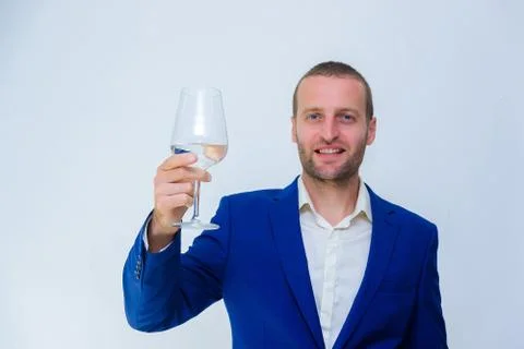 A young guy in a blue jacket is a duplicate of Hollywood actor Woody Harrelso Stock Photos