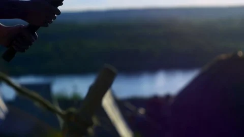 Young guy can not split firewood Stock Footage 82407611