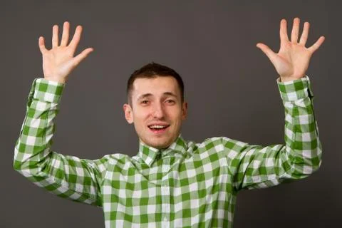 Young guy in a checkered shirt Stock Photos