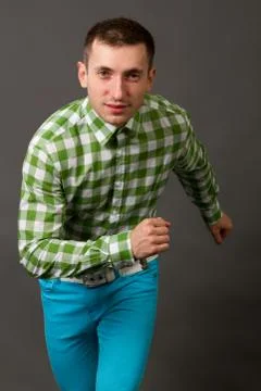 Young guy in a checkered shirt Stock Photos