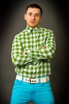 Young guy in a checkered shirt Stock Photos