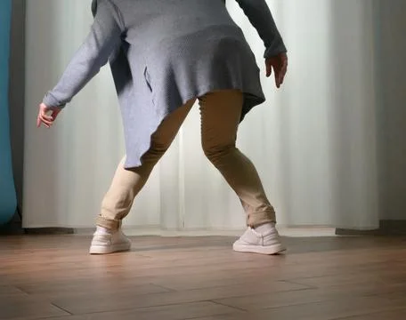 Young guy dancer in motion in a pose. A man performs a modern dance in casu.. Stock Photos