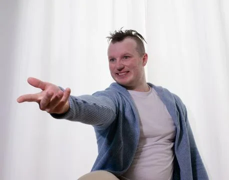 Young guy dancer in motion in a pose. A man performs a modern dance in casu.. Stock Photos