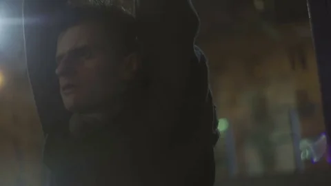 Young guy dances on the street Stock Footage 77377544